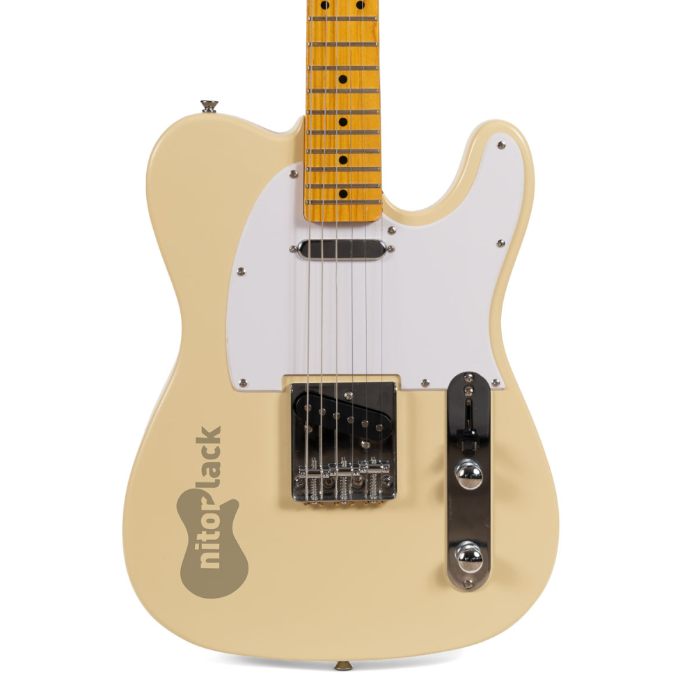 aged vintage white guitar